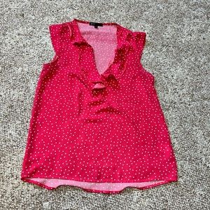 Women’s polka dot ruffled tank top.